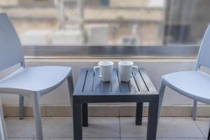 Studio 33 with a double bed & kitchenette at the new Olo living