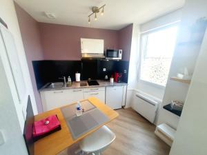 Appartements Concept Appar't Hotel - 201 : photos des chambres
