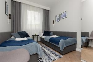 Stunning Family Apartment Ursynów with Parking & Balcony by Noclegi Renters