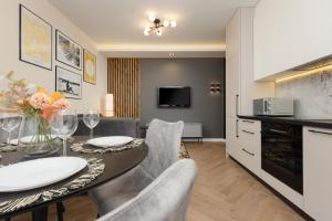 Stunning Family Apartment Ursynów with Parking & Balcony by Noclegi Renters