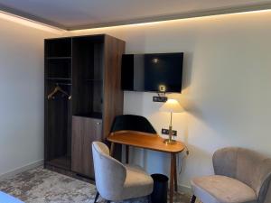 Appart'hotels Lancelot & Spa - Domaine du Roi Arthur : photos des chambres