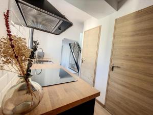 Appartements Au Duplex indus/chic de Breteuil : photos des chambres