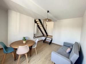 Appartements Au Duplex indus/chic de Breteuil : photos des chambres