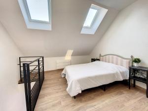 Appartements Au Duplex indus/chic de Breteuil : photos des chambres