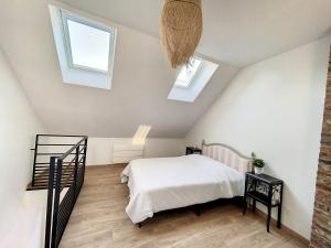 Appartements Au Duplex indus/chic de Breteuil : photos des chambres