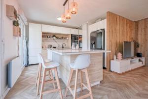 Appartements Emma - F3 apartment with a garden : photos des chambres