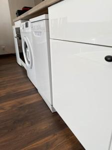 Appartements Logement moderne, dans mon jardin, pres de Paris et stade de France avec place de stationnement : photos des chambres