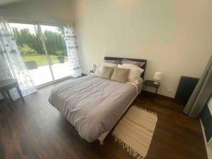 Appartements Logement moderne, dans mon jardin, pres de Paris et stade de France avec place de stationnement : photos des chambres