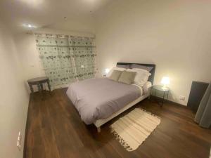 Appartements Logement moderne, dans mon jardin, pres de Paris et stade de France avec place de stationnement : photos des chambres