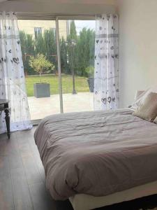 Appartements Logement moderne, dans mon jardin, pres de Paris et stade de France avec place de stationnement : photos des chambres