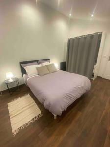 Appartements Logement moderne, dans mon jardin, pres de Paris et stade de France avec place de stationnement : photos des chambres