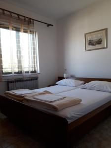 Two-Bedroom Apartment with Terrace and Sea View room in Apartments with a parking space Pag - 18325