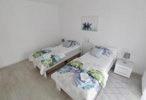 Apartments with parking space Umag - 21460