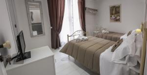 Twin Room with Balcony room in TAM Vacanze B&B