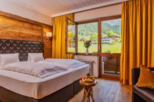 Family Suite with Balcony room in Landhaus Ramsau