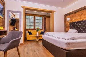 Double Room with Balcony (2 Adults + 1 Child) room in Landhaus Ramsau