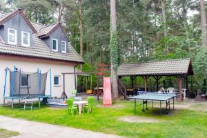 Sztil - Apartamenty i drewniane domki