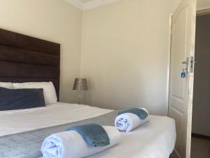 Safari Deluxe Rooms - elegant rooms with access to beautiful garden