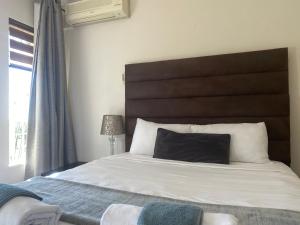 Safari Deluxe Rooms - elegant rooms with access to beautiful garden & pool