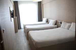 Quadruple Room room in Cinas Hotel