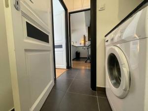 Appartements L'appartement Tomey avec parking : photos des chambres