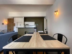 Appartements L'appartement Tomey avec parking : photos des chambres