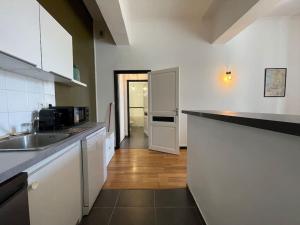 Appartements L'appartement Tomey avec parking : photos des chambres