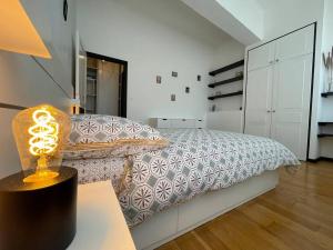 Appartements L'appartement Tomey avec parking : photos des chambres