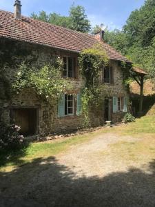 Maisons de vacances Charmante maison, en pleine verdure : photos des chambres