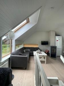 Moderne leilighet med badstue og havutsikt