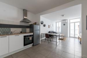 Appartements Le Cavalier - Appt climatise dans le centre ville : photos des chambres