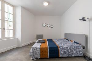 Appartements Le Cavalier - Appt climatise dans le centre ville : photos des chambres