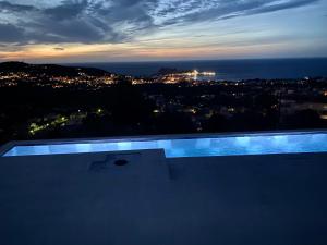 Maisons de vacances Villa Bellagio - Villa neuve, superbe vue, piscine : photos des chambres