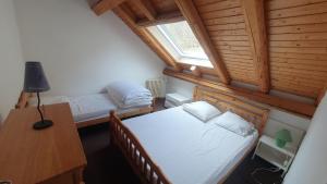 Appartements Rochesson - Le Chalet : photos des chambres