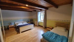 Appartements Rochesson - Gite : photos des chambres