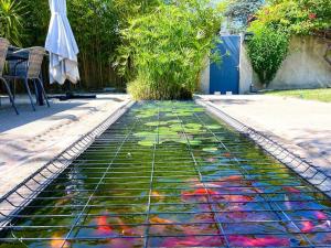 Villas Charmante villa avec piscine et jardin paysage : photos des chambres