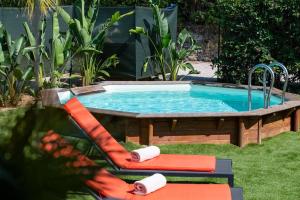 Villas Maison Tropezienne en plein centre avec jardin et piscine : photos des chambres