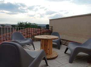 Maisons de vacances Maison de charme avec patio et terrasse de toit : Maison 1 Chambre