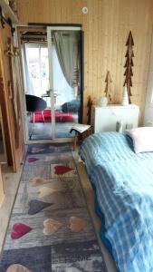 Appartements Logement style Tiny House : photos des chambres