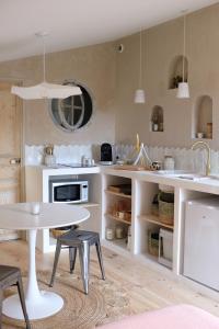 Appartements Studio Confort + : photos des chambres