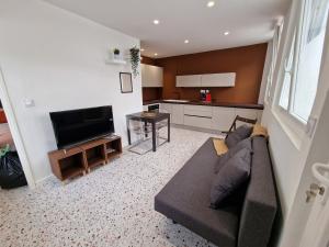 Appartements maison PING ,en face des arenes : photos des chambres