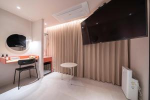 Croissant Hotel Guri by Aank