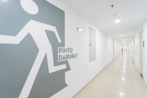 RedLiving Apartemen Patra Land Urbano - Happy Rooms Tower Mid-West with Netflix