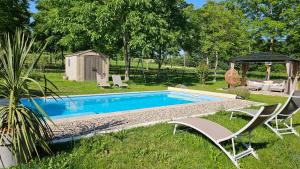 Maisons de vacances Charmant gite piscine privee chauffee climatise aux portes du Perigord entre Villereal et Monpazier : photos des chambres