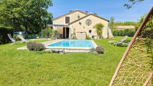 Maisons de vacances Charmant gite piscine privee chauffee climatise aux portes du Perigord entre Villereal et Monpazier : photos des chambres