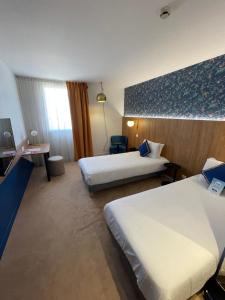 Hotels Kyriad Aix Les Milles - Plan de Campagne : photos des chambres