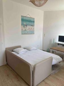 Appartements Les Pannetons : 4 pers, 3 minutes de la plage : photos des chambres