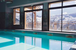 Appart'hotels Dormio Resort Les Portes du Grand Massif : photos des chambres