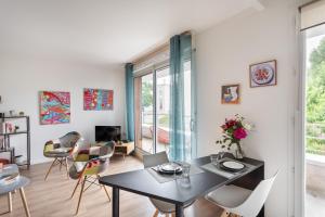 Appartements Bahibe - Balcon et parking au calme proche gare : photos des chambres