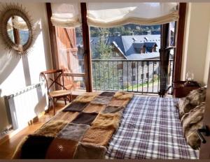 Elegante apartamento en Escarrilla con vistas al valle